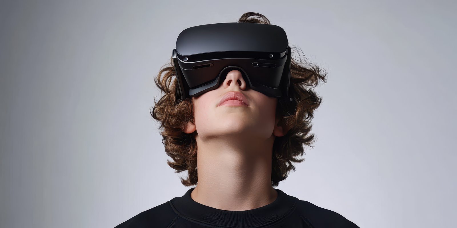 Young person experiences immersive virtual reality technology with a sleek headset indoors